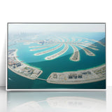 Acrylic print of Dubai skyline in muted gray and blue tones, framed in white, suitable for modern art wall decor.