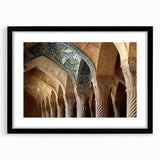 Abstract art print featuring a colorful, textured depiction of a Middle Eastern scenery, framed in black.
