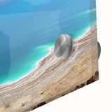 Large abstract depiction of the Dead Sea in muted blues and grays on acrylic glass.