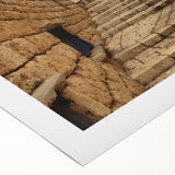 Art deco poster of Jerusalem skyline in muted gold and blue tones on rolled canvas, ideal for dining room decor.