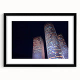 Abstract art print of Tel Aviv with vibrant, colorful textures on a large framed canvas, ideal for living room decor.