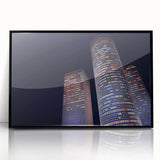 Large abstract wall art of Tel Aviv skyline in muted gray and blue tones on framed acrylic.