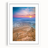 Abstract art print of a Middle Eastern landscape in muted earth tones on a white-framed mat, ideal for dining room decor.