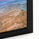 Extra large framed canvas depicting a textured Middle Eastern scenery in black with colorful art accents.