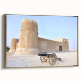 Framed canvas featuring a vintage landscape painting of a Middle Eastern scenery in black and gold.