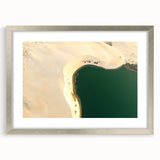 Textured abstract art print of a Saudi Arabian landscape in muted earth tones on a framed silver mat.