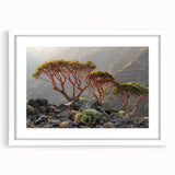 Abstract art print of a Middle Eastern landscape in muted earth tones on a framed white mat, ideal for dining room decor.