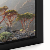 Close-up of a framed canvas featuring a textured, colorful Middle Eastern scenery in black, ideal for living room decor.