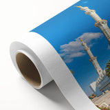 Art deco poster of Abu Dhabi skyline in muted gold and blue tones on rolled canvas, ideal for nursery wall art.