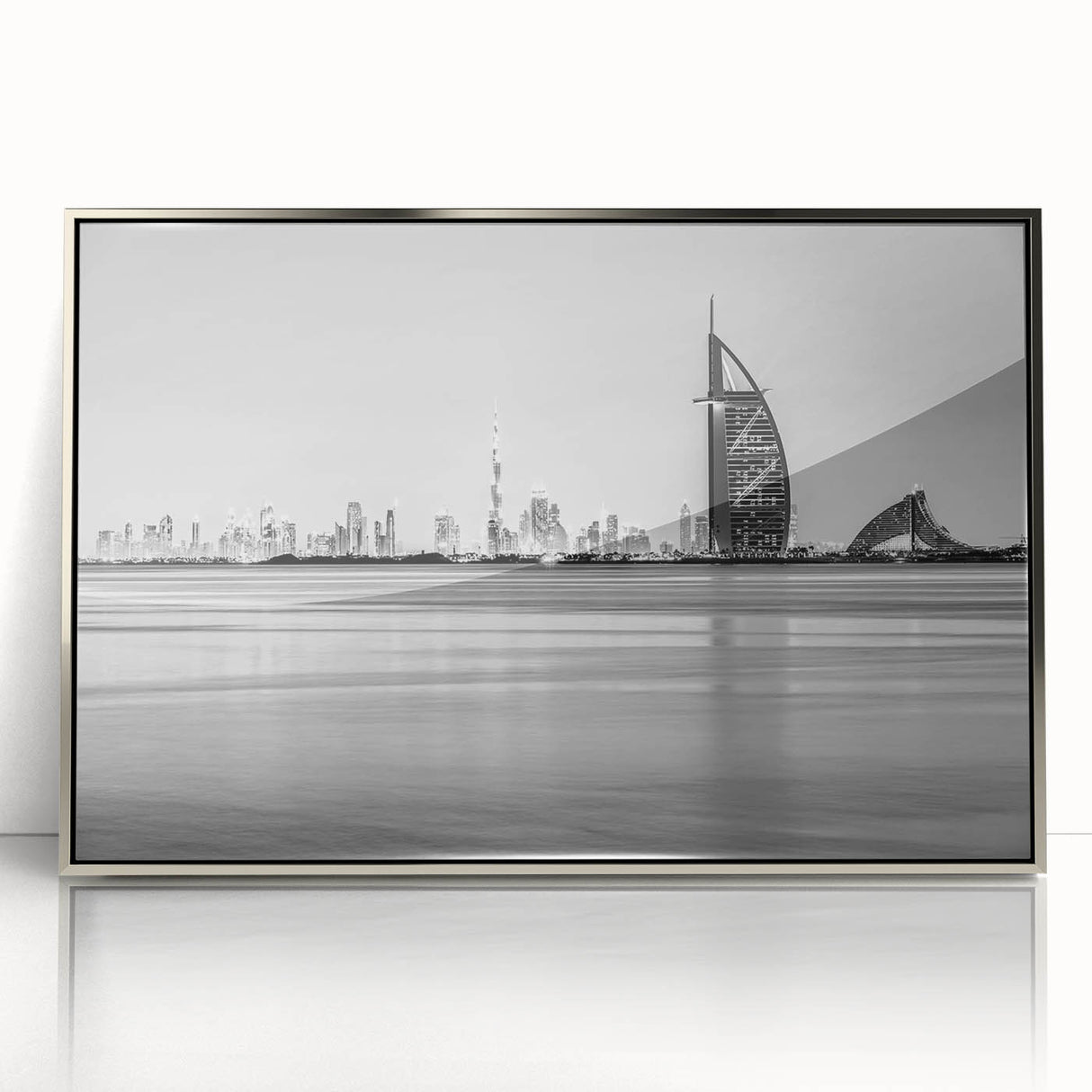 Mid-century modernist art depicting the Burj Al Arab in muted silver tones on a framed acrylic.