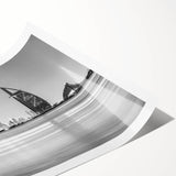 Extra large rolled print featuring line art flowers with a backdrop of the Burj Khalifa, in black and white.