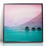 Large abstract wall art depicting the serene Bora Bora landscape in muted blue and green tones, framed in black acrylic.