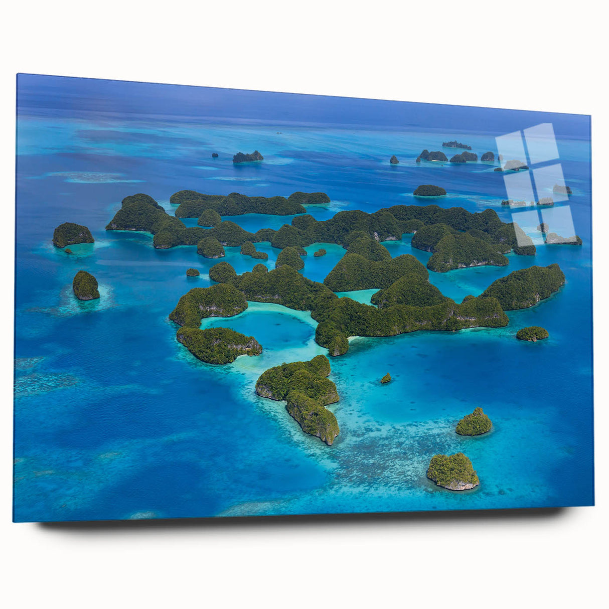 Large abstract wall art of an ocean scene in blue and green hues, acrylic glass format.