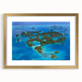 Extra large abstract art print of a Micronesian oceanic scene in textured blues and greens on a framed canvas.