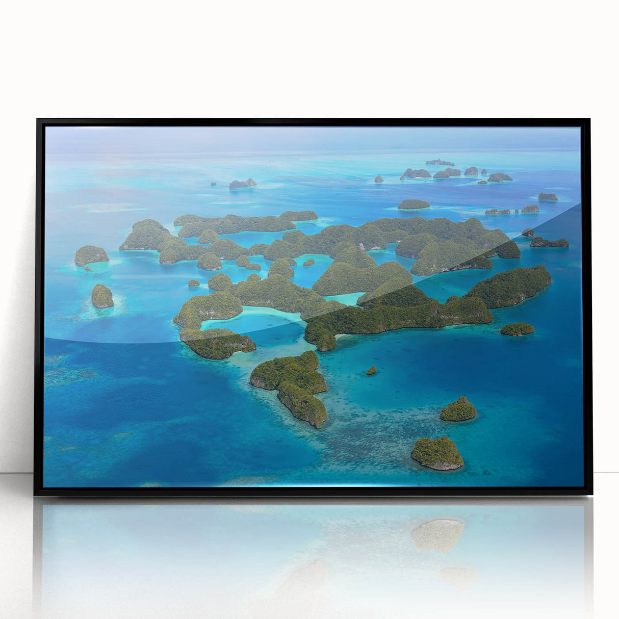 Large abstract wall art featuring oceanic hues in a mid-century modernist style, acrylic print framed in black.
