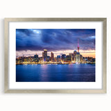 Textured abstract art print of Auckland skyline in muted blue and gray tones on framed canvas, ideal for bedroom wall decor.