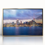 Acrylic print of Auckland skyline with muted blue and gold tones, in a mid-century modernist style.