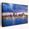 Large stretched canvas depicting Auckland skyline in muted blues and grays, suitable for kitchen wall art.