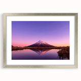 Textured art print of Taranaki in abstract style with muted earth tones, framed in silver, ideal for bedroom art.