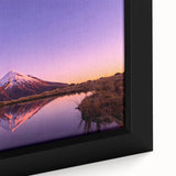 Black wall art featuring a textured depiction of Mount Taranaki in New Zealand.