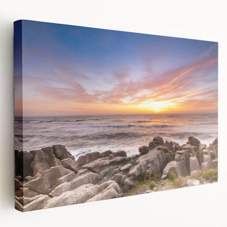 Large wall art on stretched canvas depicting the rugged West Coast of New Zealand in soft gray and blue tones.