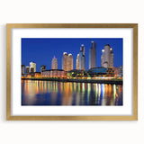 Extra large abstract art print of Buenos Aires skyline in gold frame, featuring textured strokes in earth tones.