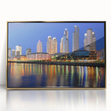 Mid-century modernist acrylic print of Buenos Aires skyline in gold and teal tones, ideal for modern art wall decor.
