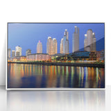 Art deco poster of Buenos Aires scenery in muted blue and white tones, acrylic print framed.