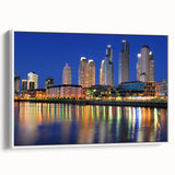 Vintage poster art of Buenos Aires skyline in vibrant colors on extra large framed canvas, ideal for living room decor.