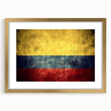 Extra large abstract art print of a textured Colombian landscape in muted earth tones, framed in gold.