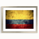 Textured abstract art print of a Colombian landscape in muted earth tones, framed in silver, ideal for bedroom decor.