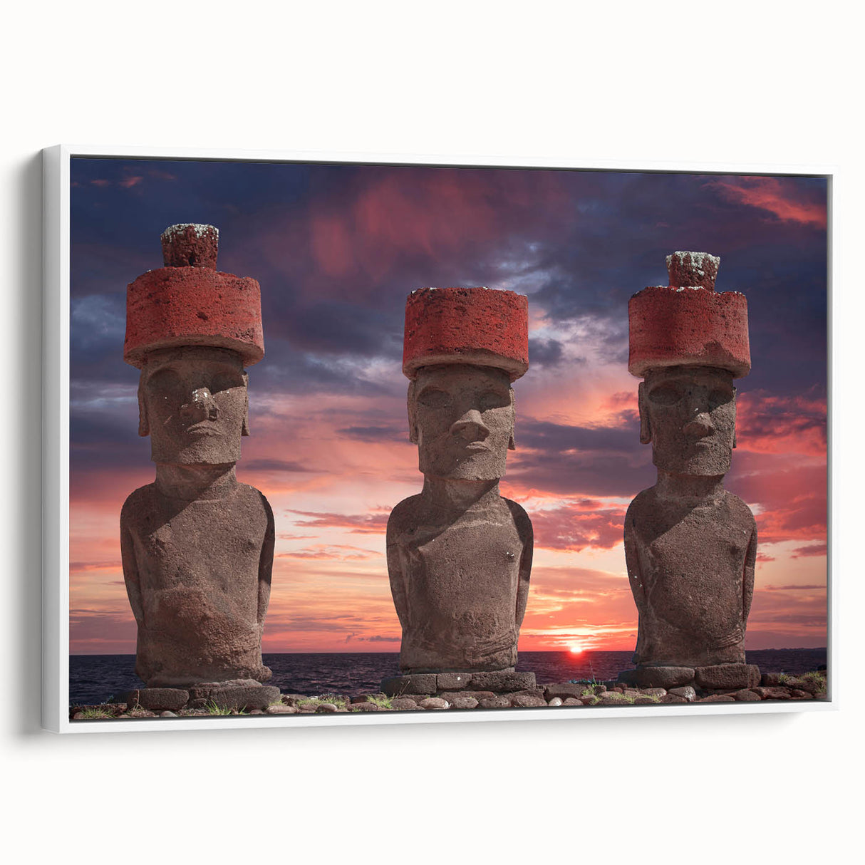 Vintage poster art of Easter Island statues on framed canvas, featuring muted earth tones, ideal for living room decor.