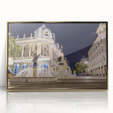 Large art print of a South American landscape in muted earth tones, framed in gold acrylic.