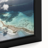 Framed canvas of a textured black wall art depicting a vibrant, colorful South American scenery, ideal for living room decor.