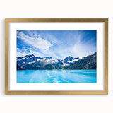 Extra large abstract art print of Alaskan scenery in muted earth tones, framed with a gold mat, ideal for living room decor.