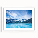 Abstract art print of Alaska scenery in muted earth tones on a white-matted frame, ideal for dining room decor.