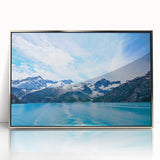 Mid-century modernist art depicting Alaskan scenery in muted gray and blue tones on a framed acrylic print.