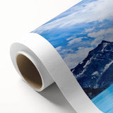 Art Deco poster of Alaska scenery on rolled canvas, featuring cool blue and white tones, ideal for nursery wall art.