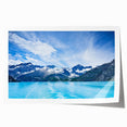 Scenic Alaska landscape on rolled canvas with vivid blue and green tones, suitable for dining room decor.