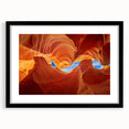 Extra large framed wall art of abstract Arizona Antelope Canyon in vibrant orange and red tones, ideal for living room decor.