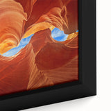 Close-up of a black framed canvas featuring textured, colorful Arizona Antelope Canyon, ideal for living room decor.