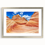 Textured art print of Arizona's Coyote Buttes in muted earth tones, framed in silver, ideal for bedroom art.