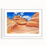 Abstract art print of Arizona's Coyote Buttes in muted earth tones on a white framed canvas.