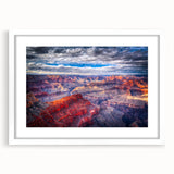 Abstract art print of the Grand Canyon in earth tones, framed in white, suitable for dining room decor.