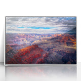 Acrylic print of the Grand Canyon in muted earth tones, framed in white, suitable for modern art wall decor.
