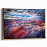 Framed canvas featuring a vintage-style landscape painting of the Grand Canyon in muted earth tones.