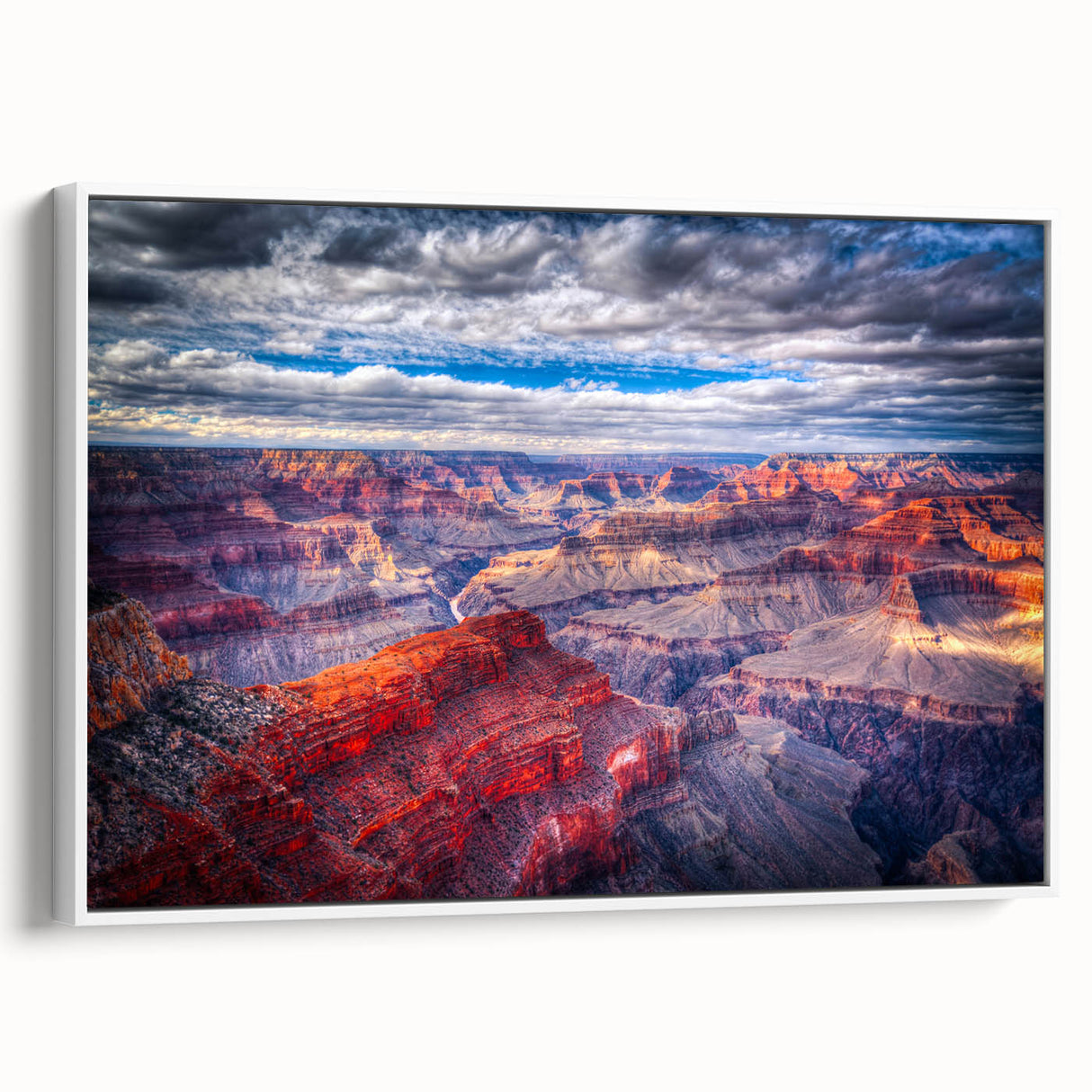 Vintage poster art of Grand Canyon on framed canvas, featuring a colorful palette.