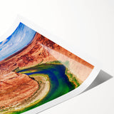 Extra large wall art of Horseshoe Bend in Arizona, featuring muted earth tones on a rolled canvas.