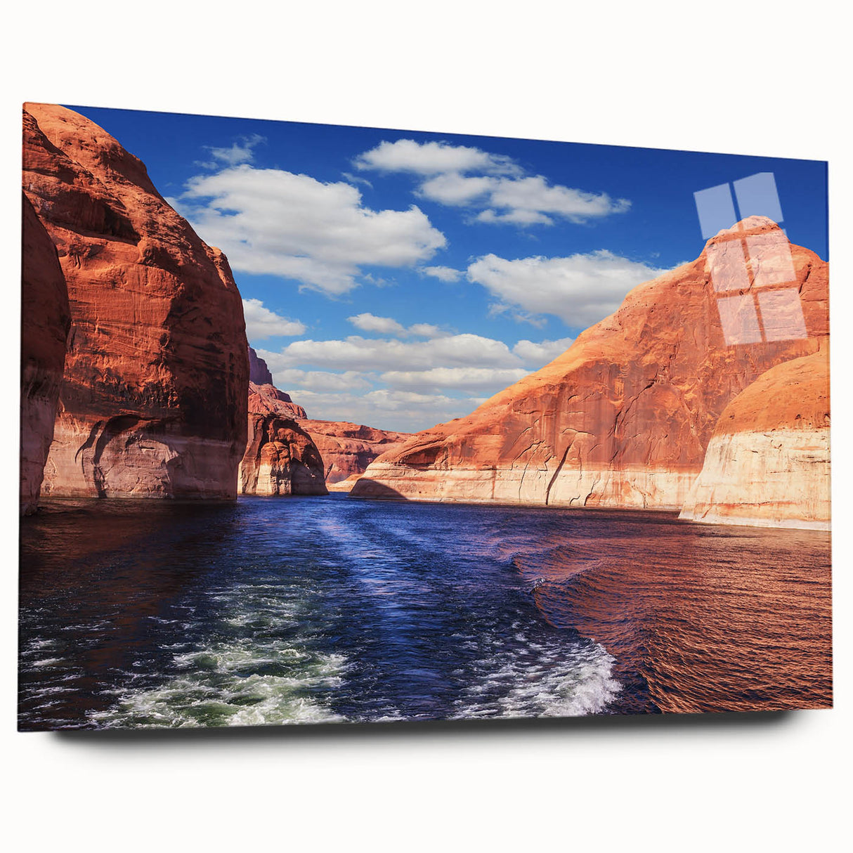 Large abstract wall art of Lake Powell on acrylic glass, featuring vivid blue and orange tones.