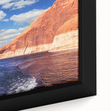 Framed canvas of Lake Powell with textured black edges and vibrant colors, ideal for living room decor.